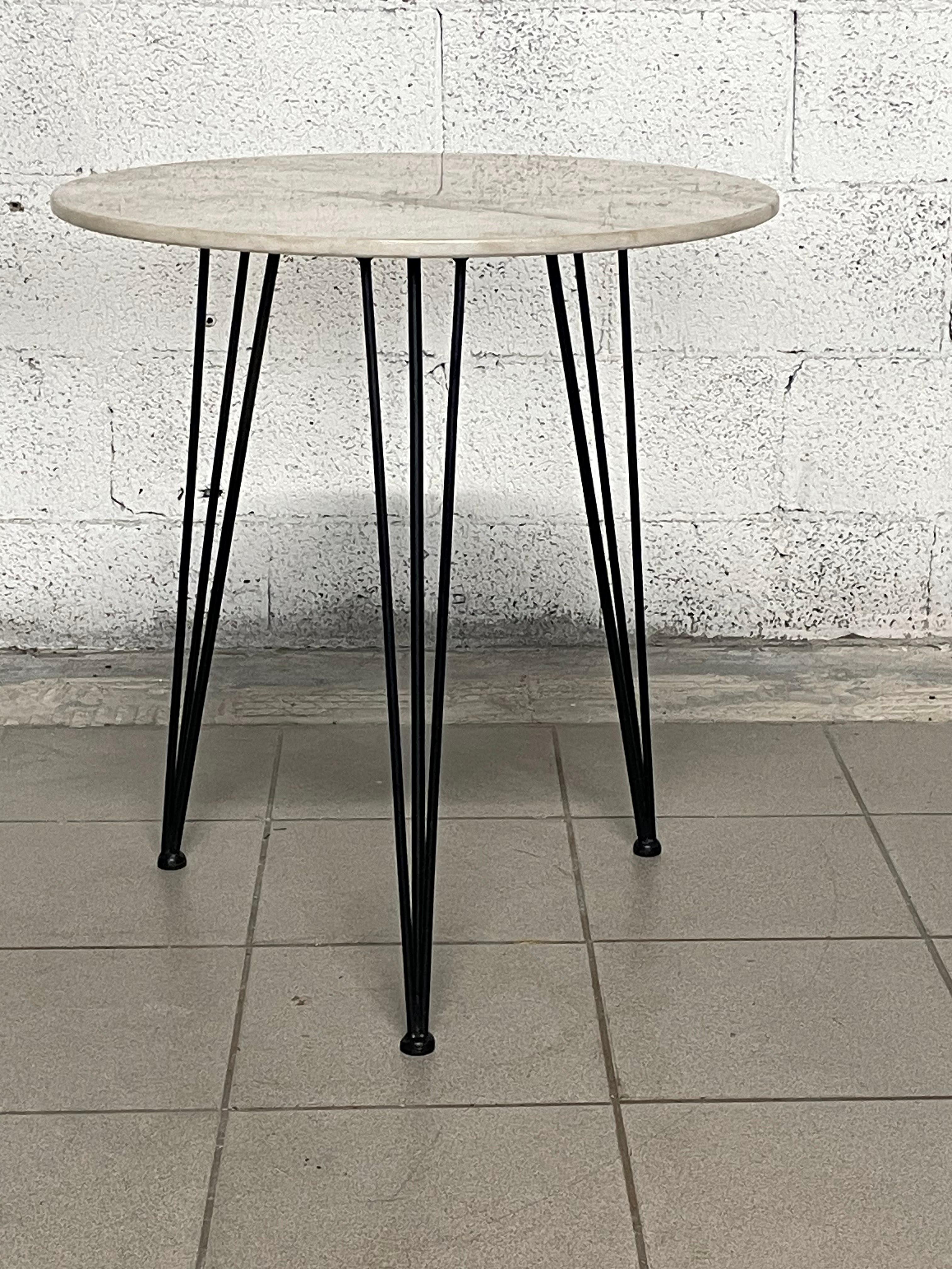 1950s service table.

Black painted metal tripod frame and white marble top.
Very elegant and functional.