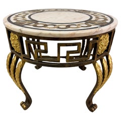 Mesa de centro circular de mármol con base de hierro y bronce Siglo XX Italiano