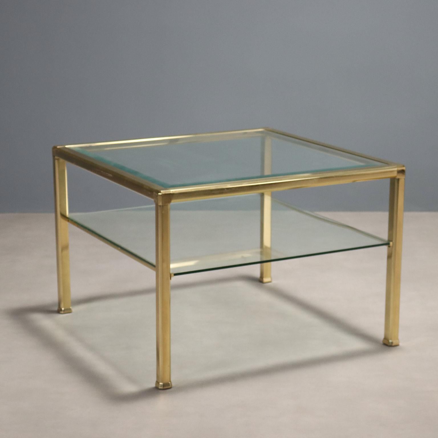 Double-top center table, brass and glass. 