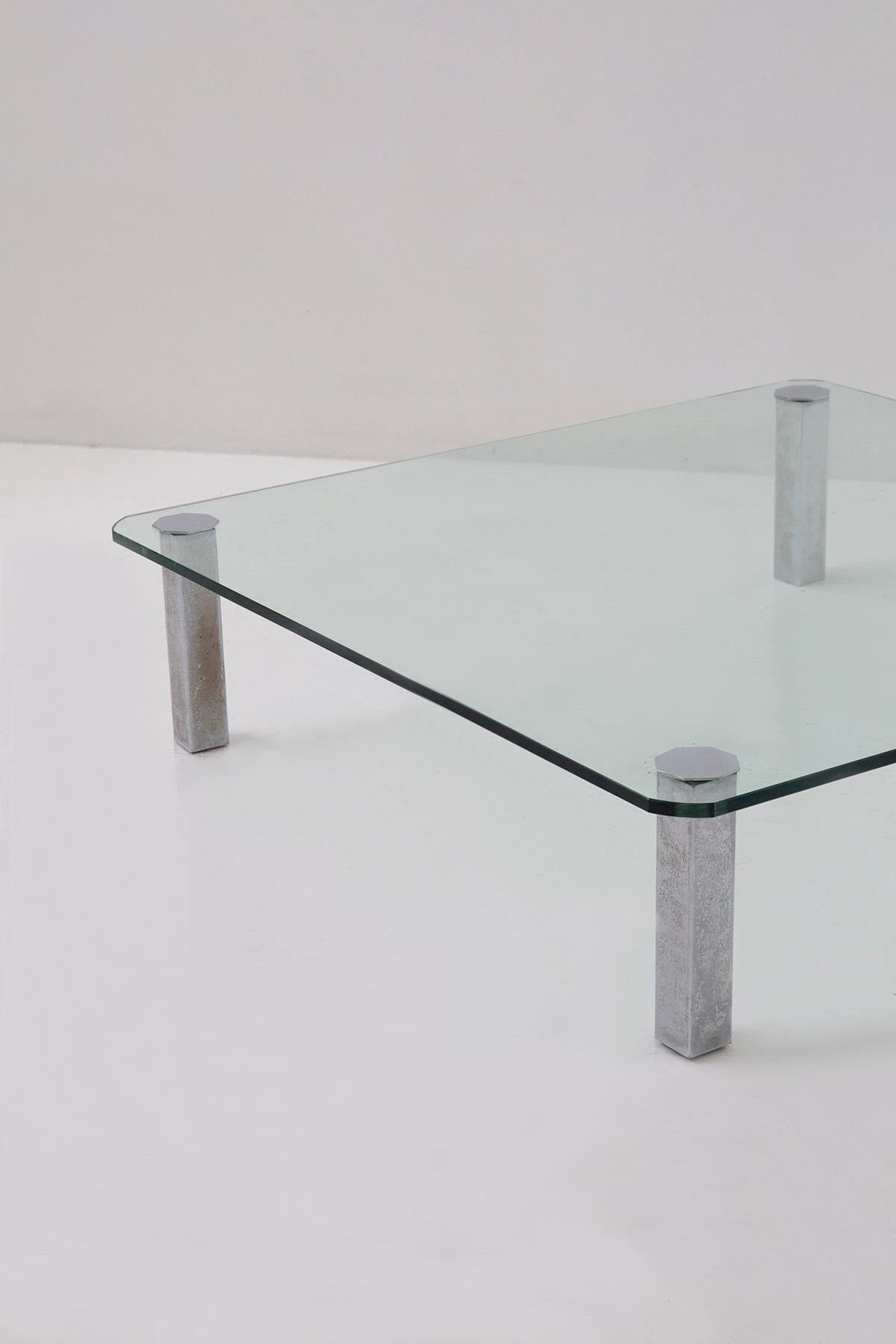Late 20th Century Vintage Italian glass coffee table with metal feet For Sale