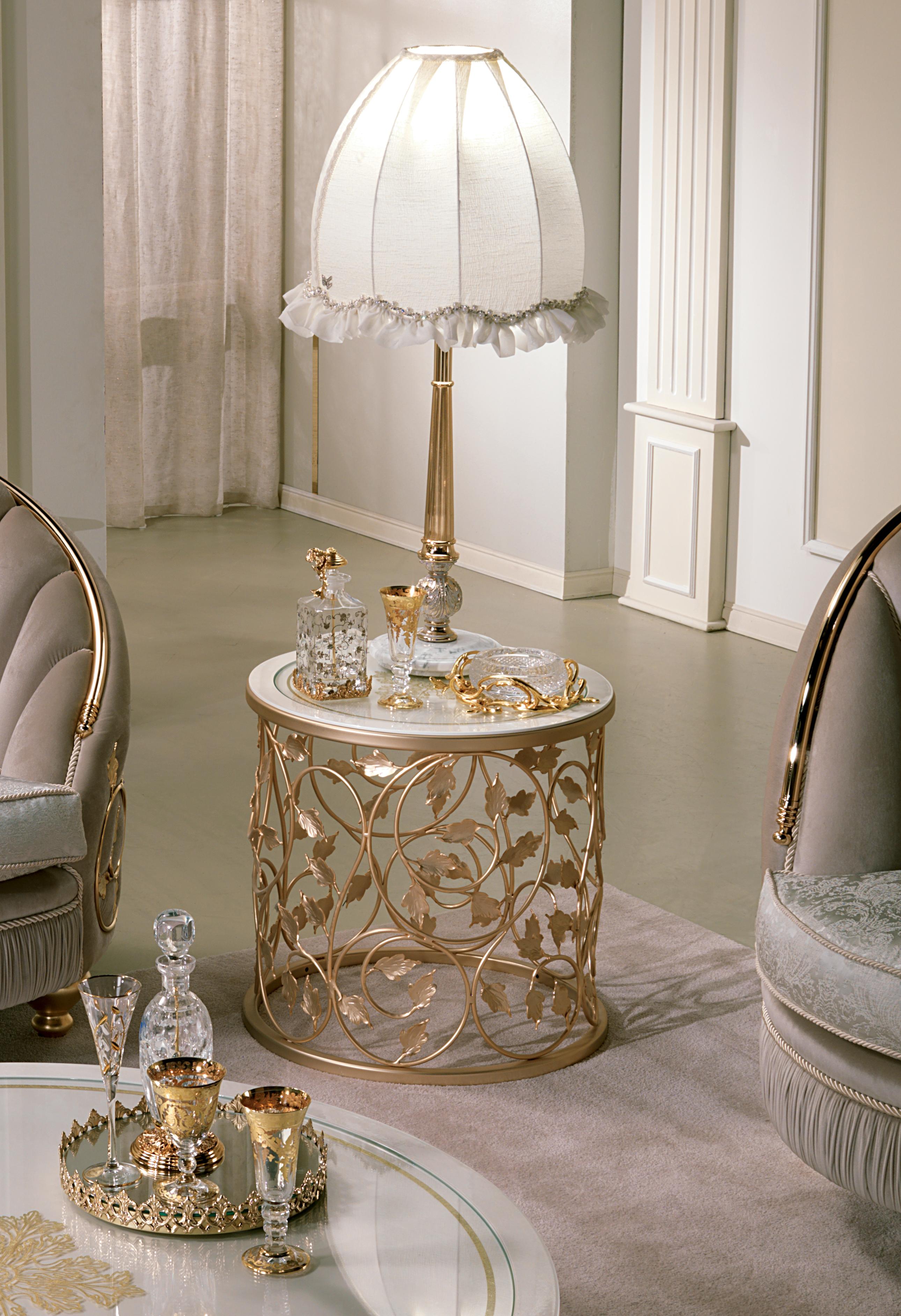 We enthusiastically introduce our AQ034 coffee table, from the AQVA collection, enhanced by a wrought-iron base with hand-shaped leaves and later galvanized in 24-karat gold. This piece of furniture represents a perfect blend of classic elegance and