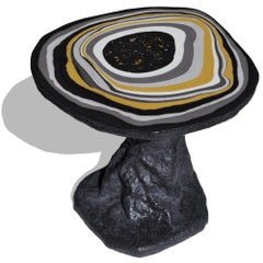 Matte black coffee table and artistically decorated top in polished scagliola by Cupioli