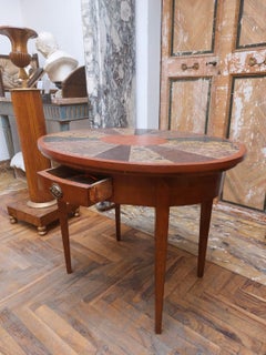 Oval coffee table with scagliola top