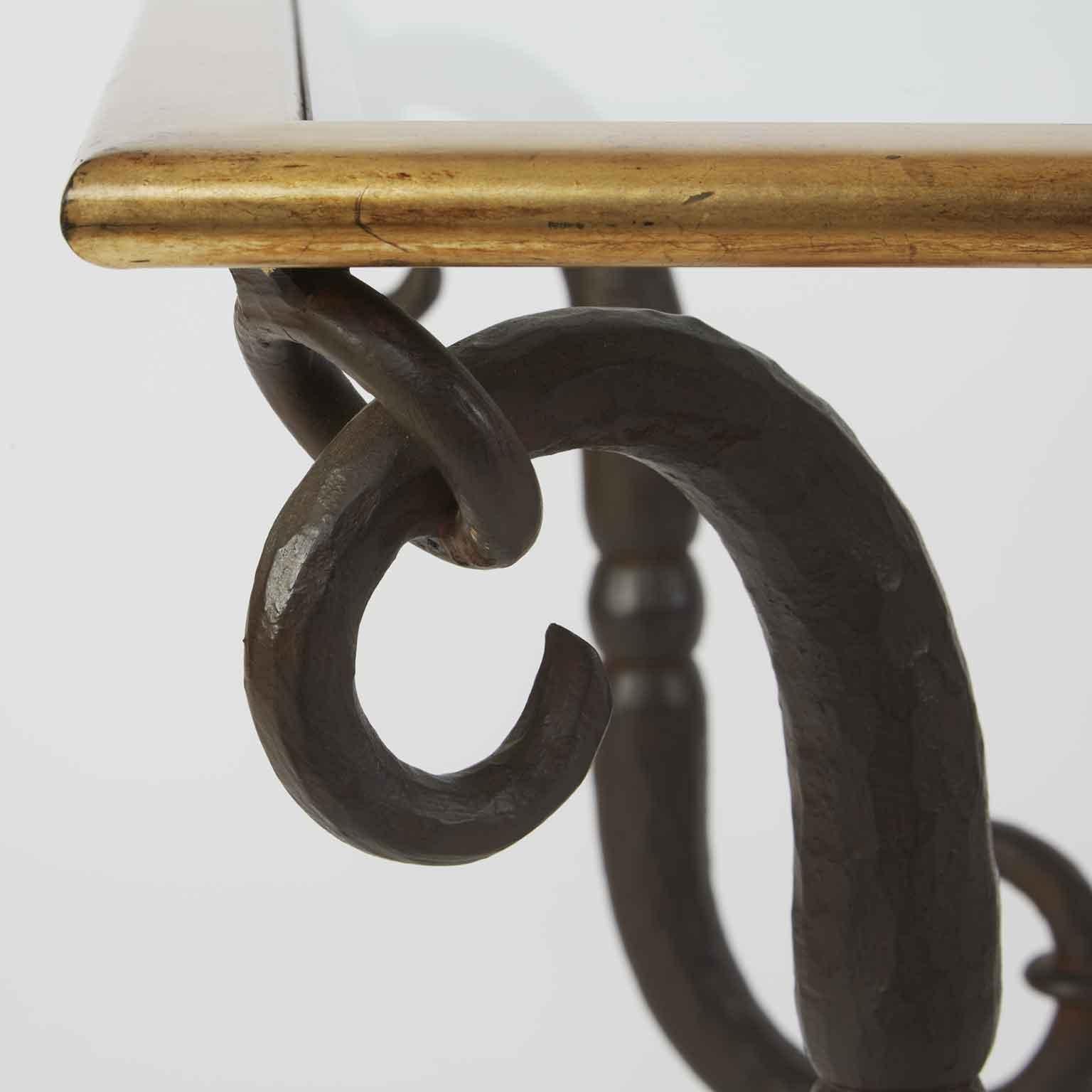 Gorgeous Italian rectangular coffee table, from the craftsmanship of Florentine artisans at Banci of Florence this hand-forged iron coffee table was born in 1980, beveled crystal tops on two levels joined by curved s-shaped uprights , dark