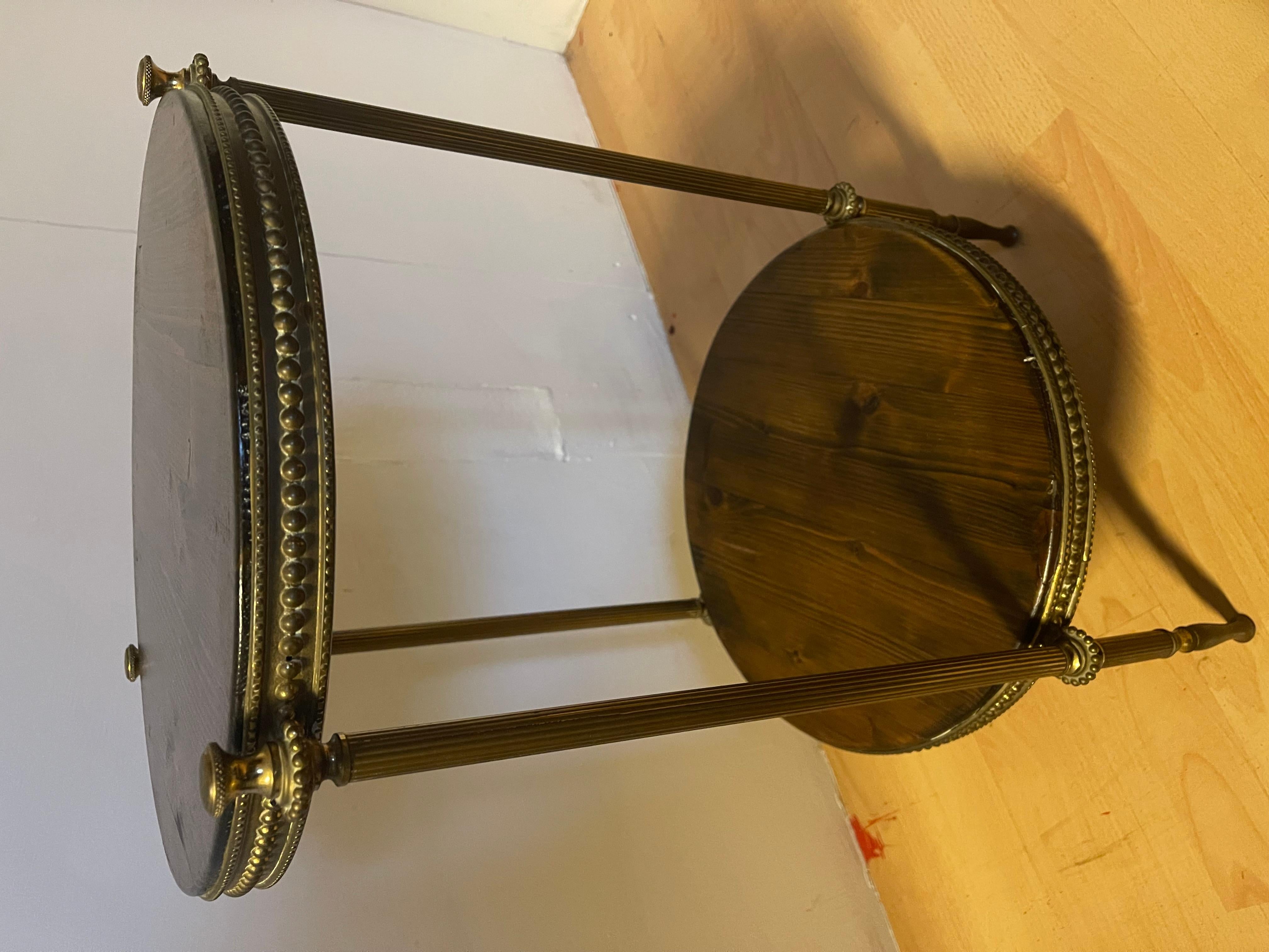 Other Two-shelf round brass and wood vintage Italian style coffee table For Sale