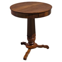 Round walnut coffee table with a drawer, 19th century
