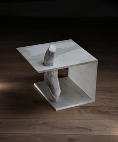 Capolino 1 sculpture coffee table in white veined marble
