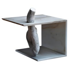 Capolino 1 sculpture coffee table in white veined marble