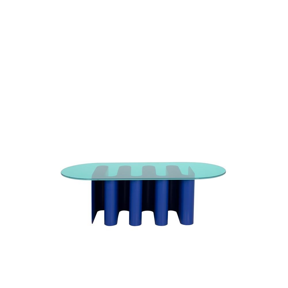 Tavolino2 ultramarine blue side table by Pulpo
Dimensions: D135.5 x W59.5 x H40 cm
Materials: Glass, aluminum

All color combinations available on request. 

Clear lines, avantgarde shape: Julia Chiaramonti’s design philosophy is inspired by