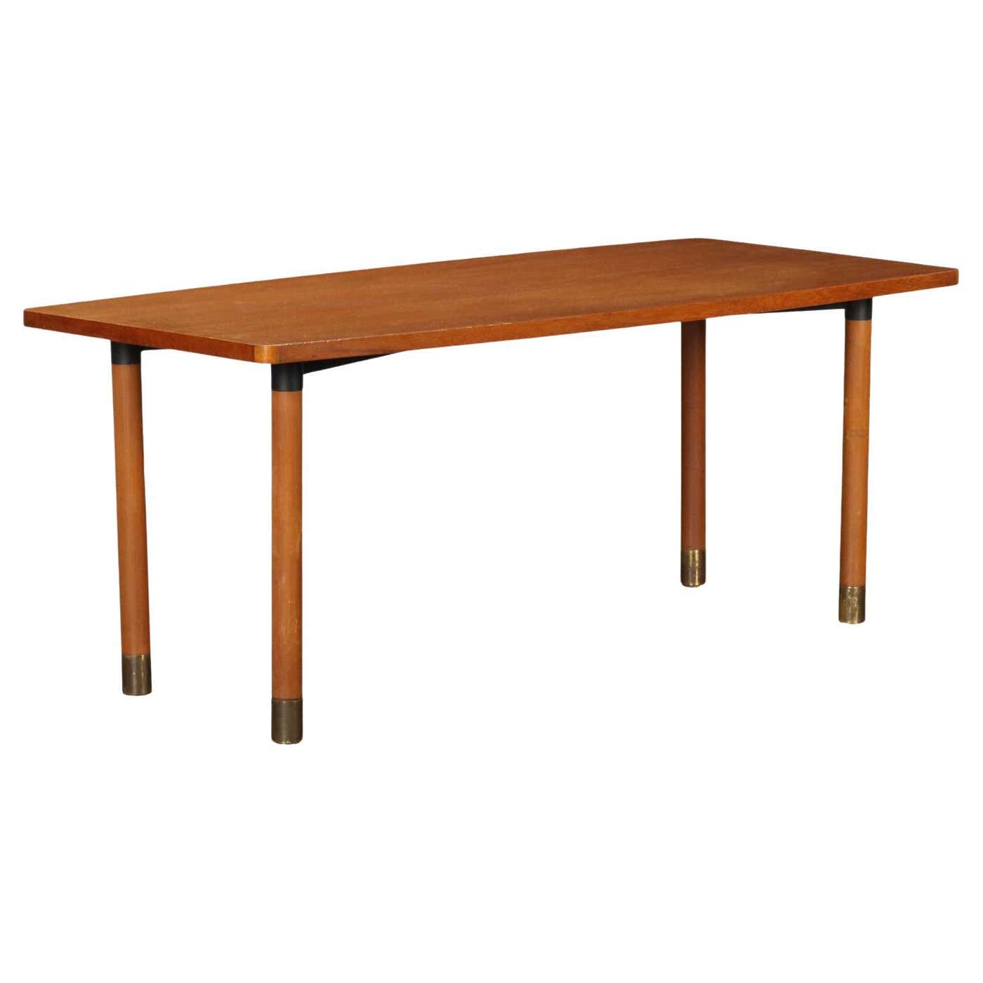 1960s teak table and brass ferrules For Sale at 1stDibs