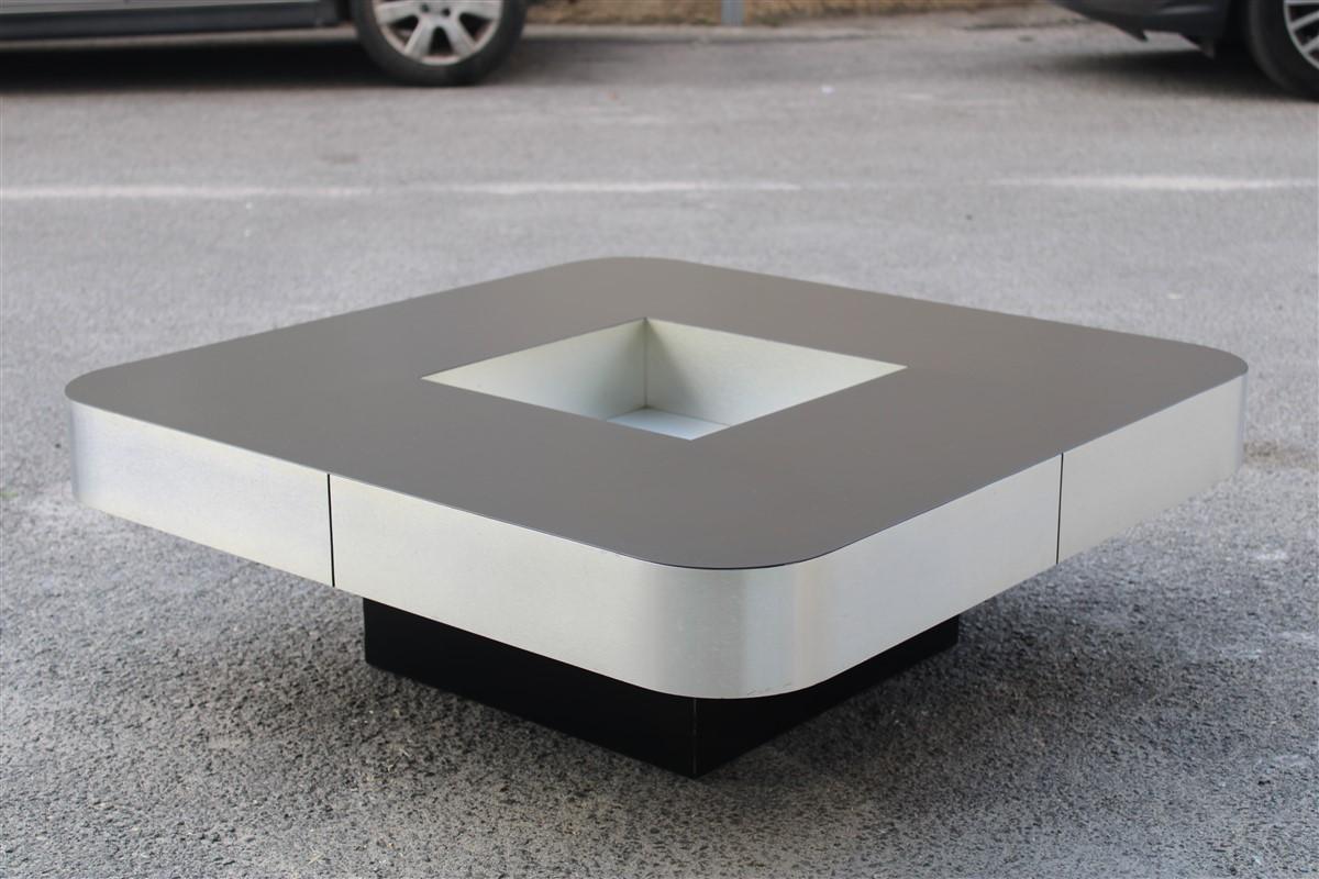 Elegant square table beveled corners made by Mario sabot in about 1960s probable design by Willy Rizzo, in the center square recessed licquor and glass holder.