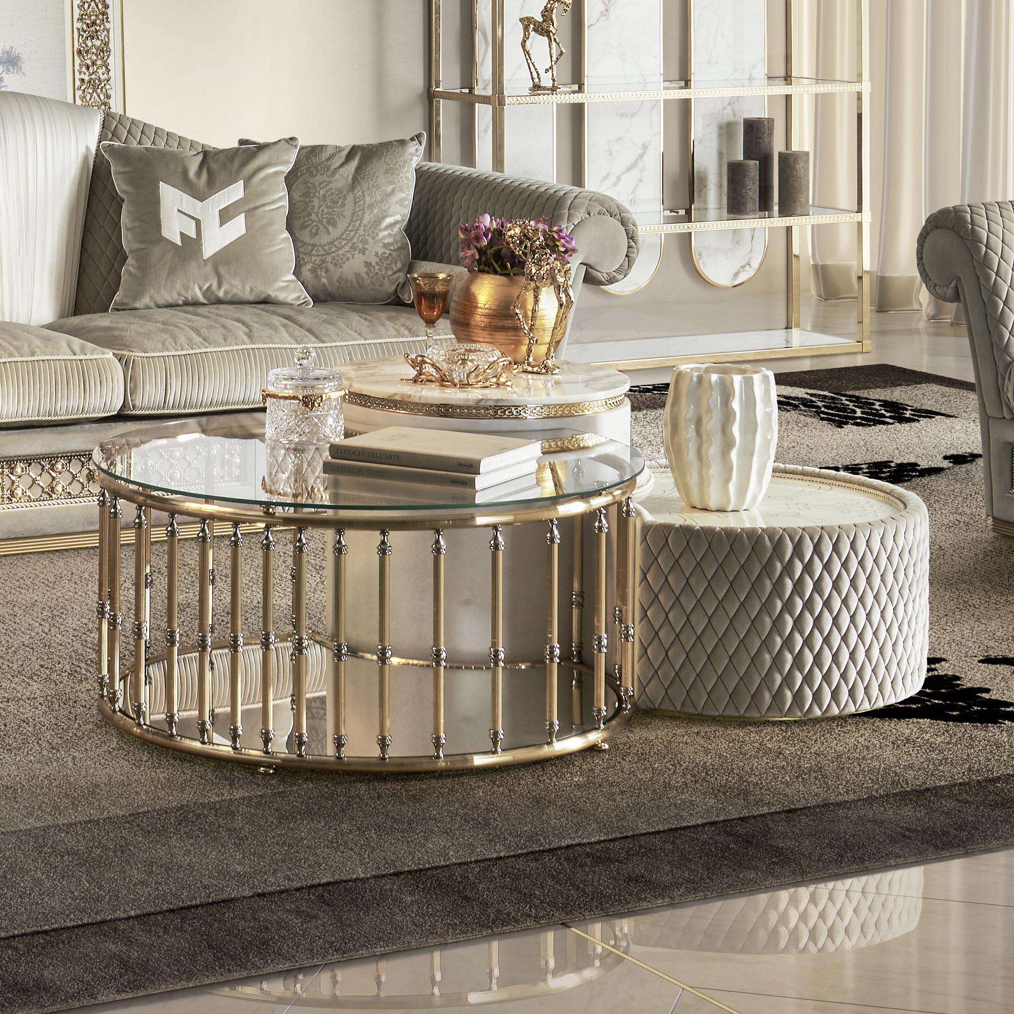 The tables in the EL074 tris can be positioned as self-standing pieces or aggregated, creating a striking composition.

What stands out in this article is the amount of materials and workmanship used:
-the main table consists of a 24-karat