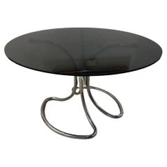 Tavolo cromato in vetro fumè anni 70 di Giotto Stoppino elegante. XX secolo.