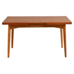 Teak and oak extending dining table, 1960s Danish design