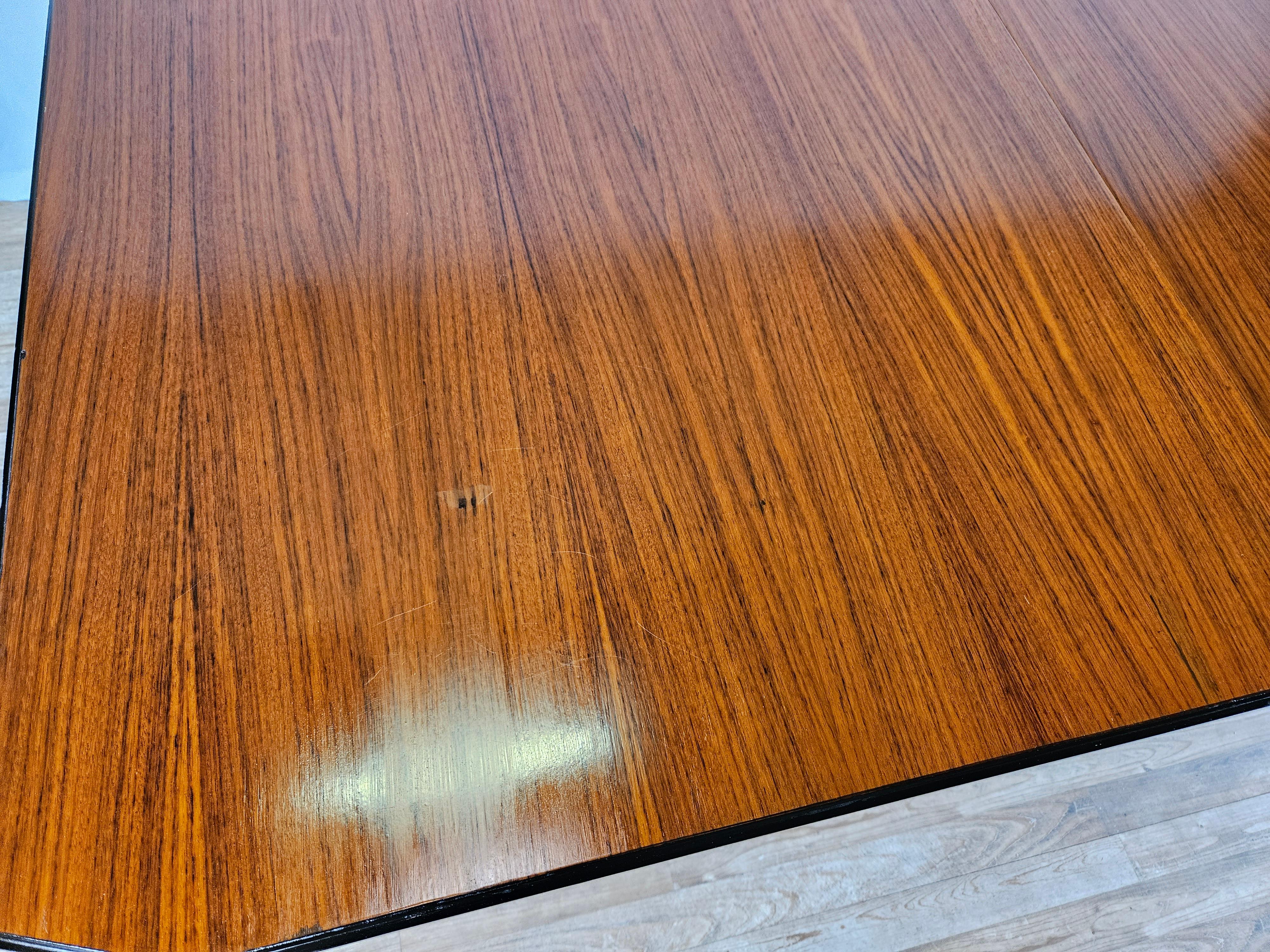 Italian Scandinavian style extending dining table in walnut and ebony For Sale
