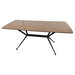 Tavolo da pranzo anni '60 in ferro con piano in formica