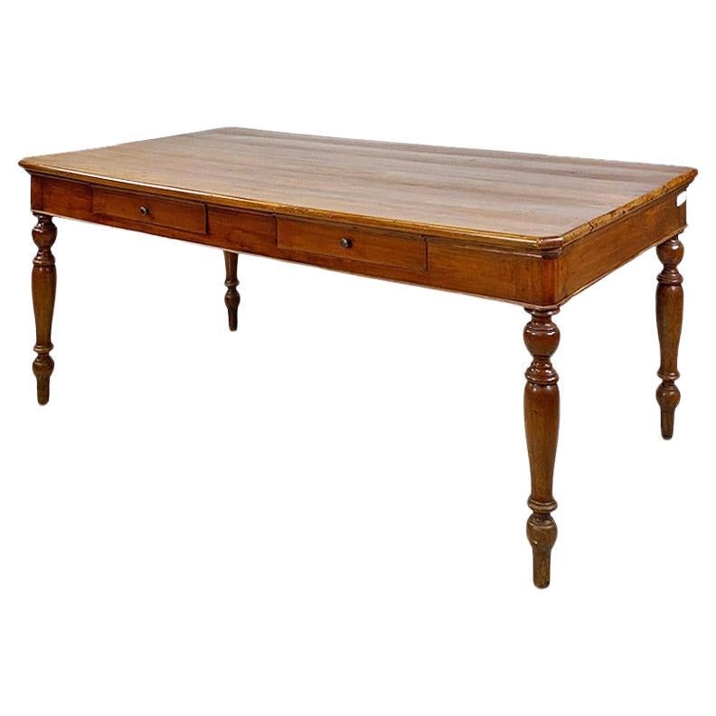 Italian dining table, antique, solid walnut with two drawers, c. 1900. For Sale