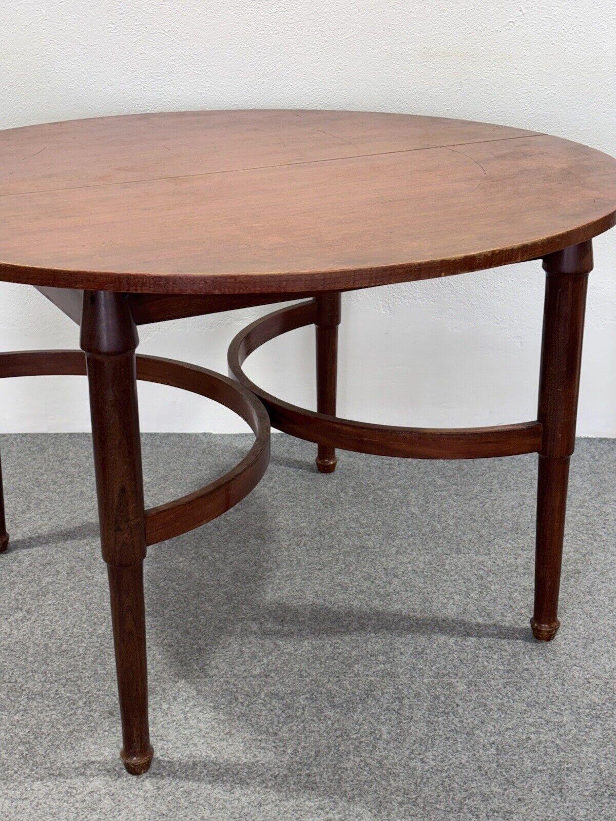 Italian Extendable oval teak dining table Modern design 1970's For Sale
