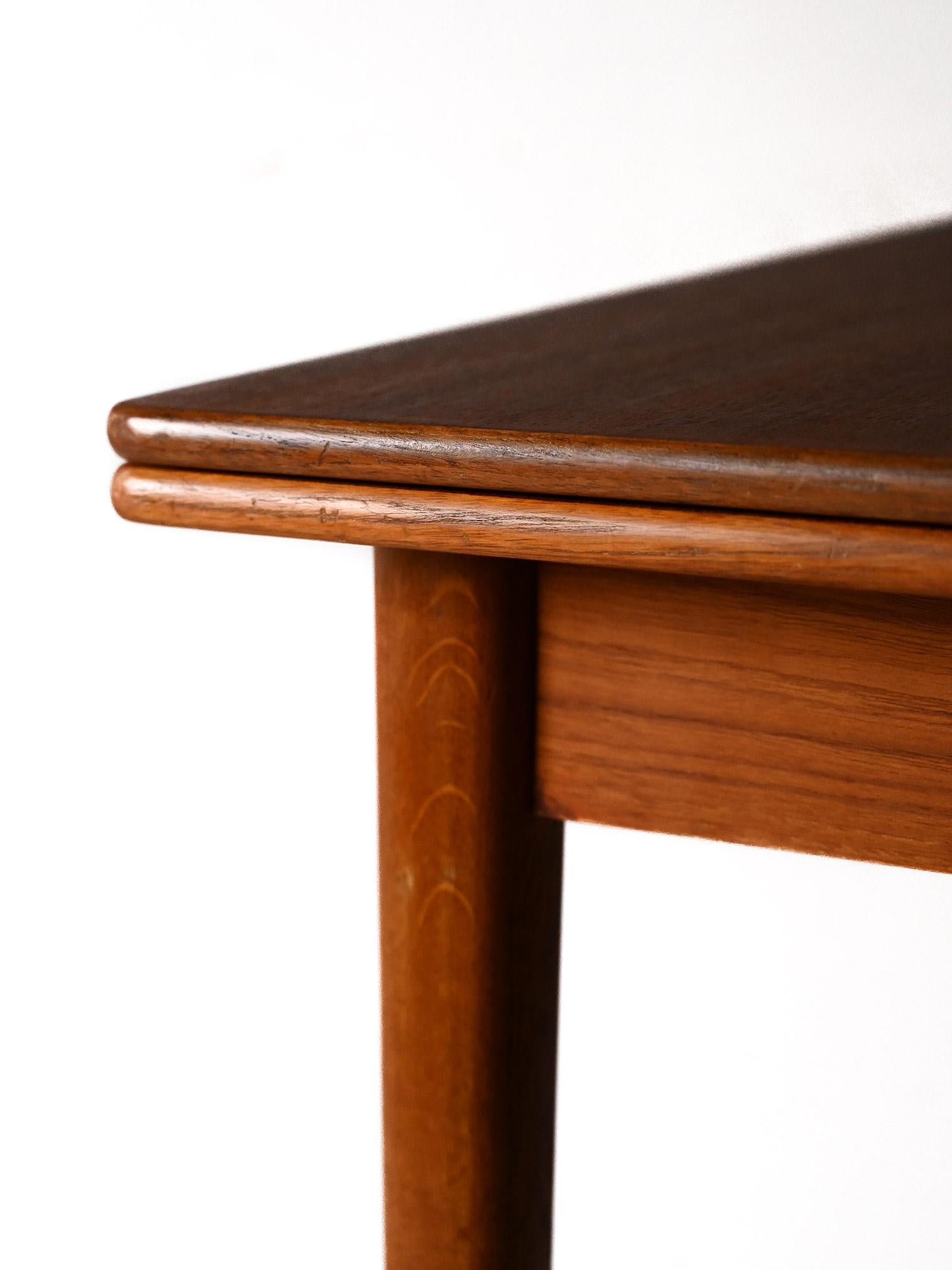 Teak Scandinavian dining table by Nils Jonsson For Sale