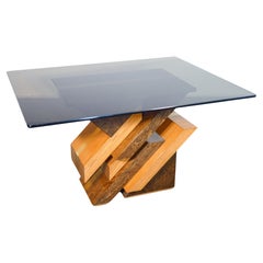 Tavolo di design firmato POGGIOLI in legno e radica, piano in vetro fumé. 1970s