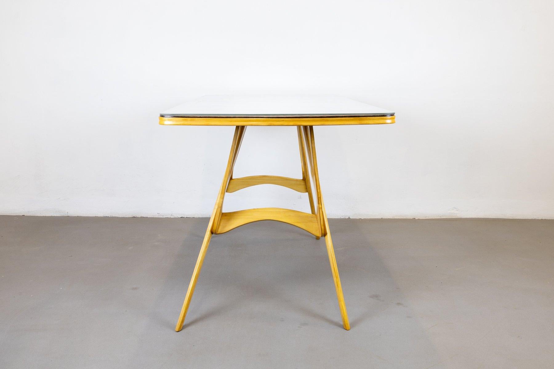 Rare, modern table, fully restored 1950s original, anthropomorphic in shape, made by Carlo Mollino's students Franco Campo and Carlo Graffi, who made it for a residence in Turin circa 1957.
this table is a unique piece with modern and innovative