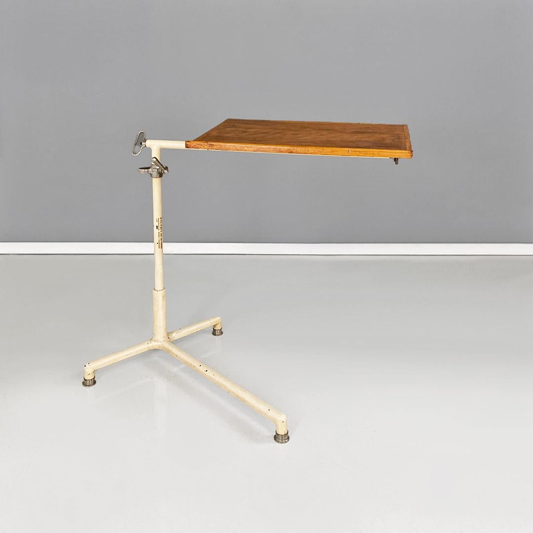 Metal Industrial iron and wood adjustable drafting or working table, ca. 1960. For Sale
