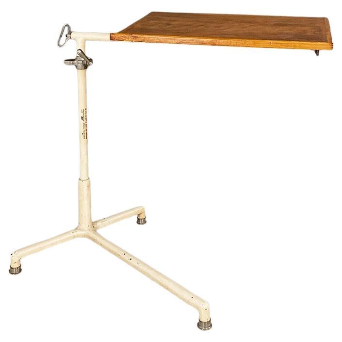 Industrial iron and wood adjustable drafting or working table, ca. 1960. For Sale