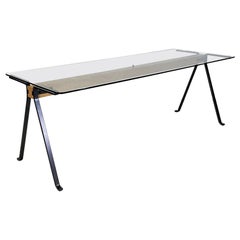 Frate Italian table in cast iron, glass and wood by Enzo Mari for Driade, c. 1980.