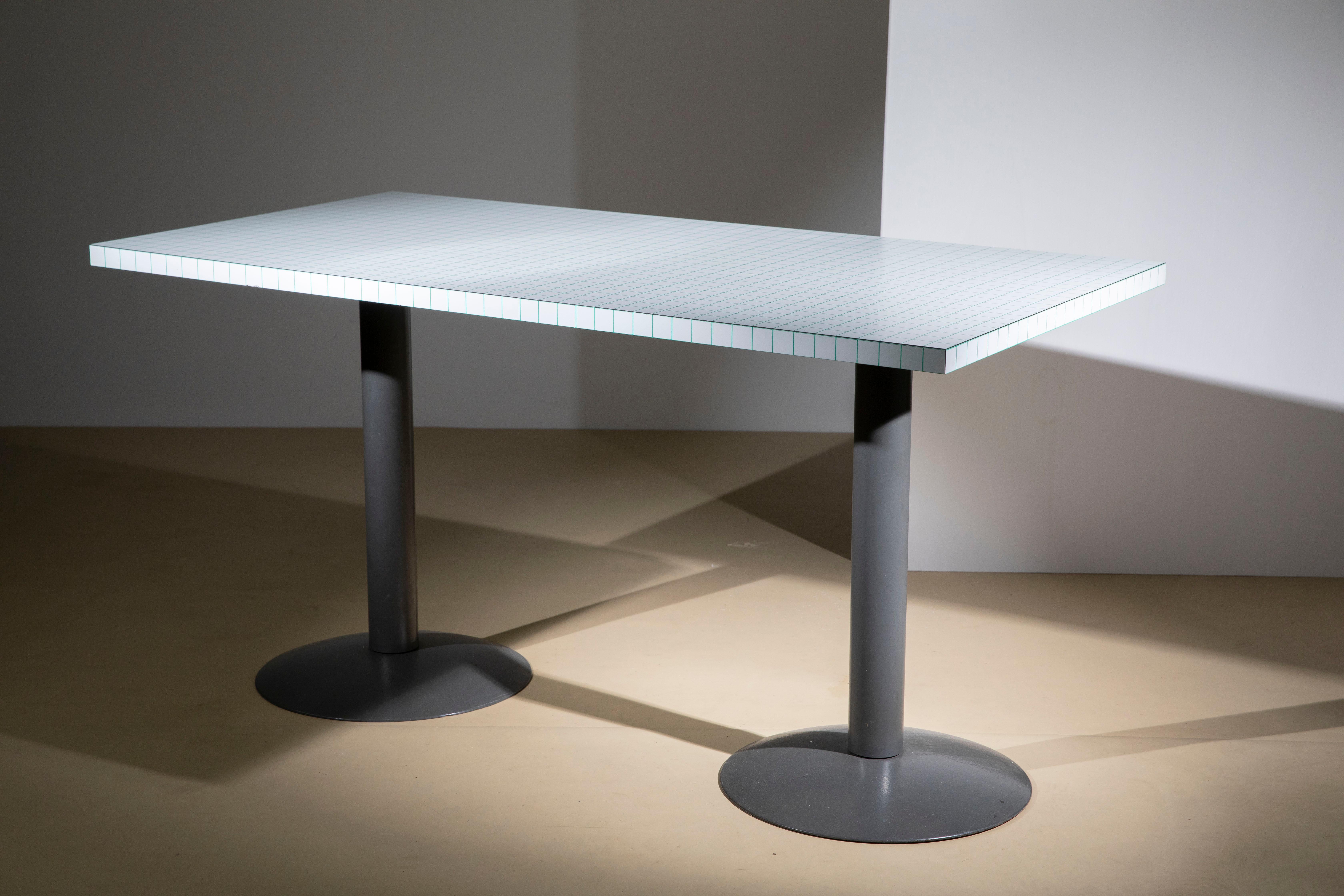 Iconic table, Italian manufacture, probably made in the 1980s, in the style of radical architecture production, features a wooden top covered in 'Misura' laminate made by Abet Laminati, in the green variant, the same material used by Superstudio to
