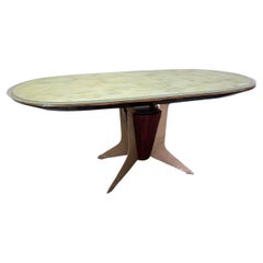 Mid-Century table in rosewood and enameled metal Design