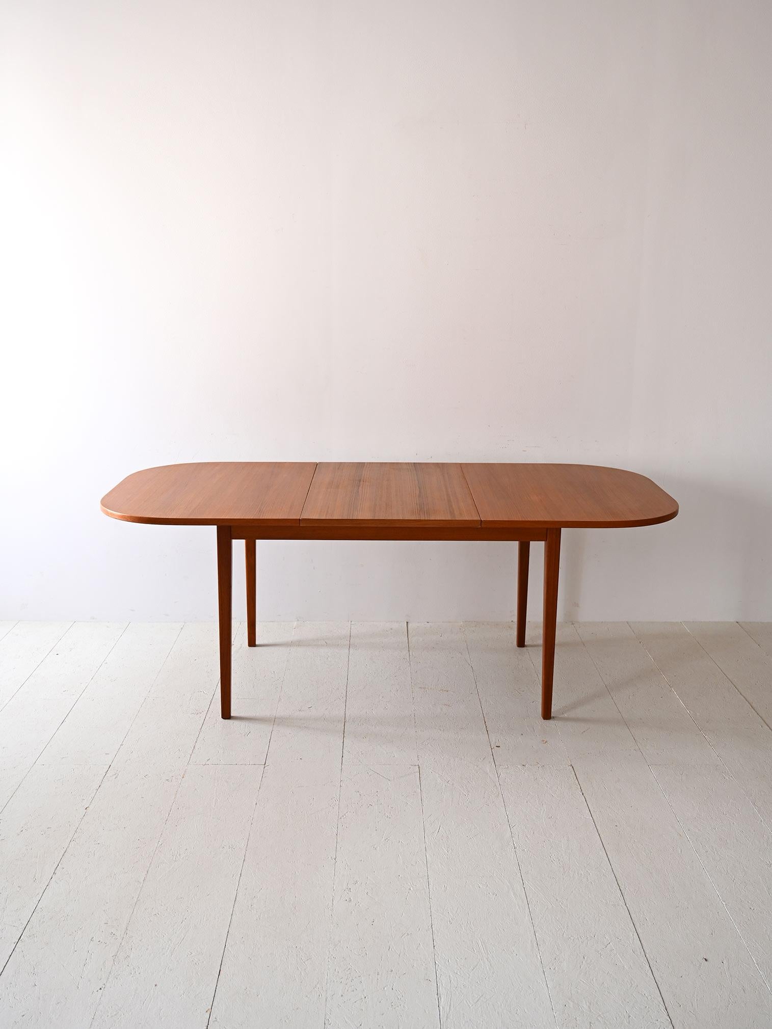 Scandinavian Modern Oval extending teak table For Sale