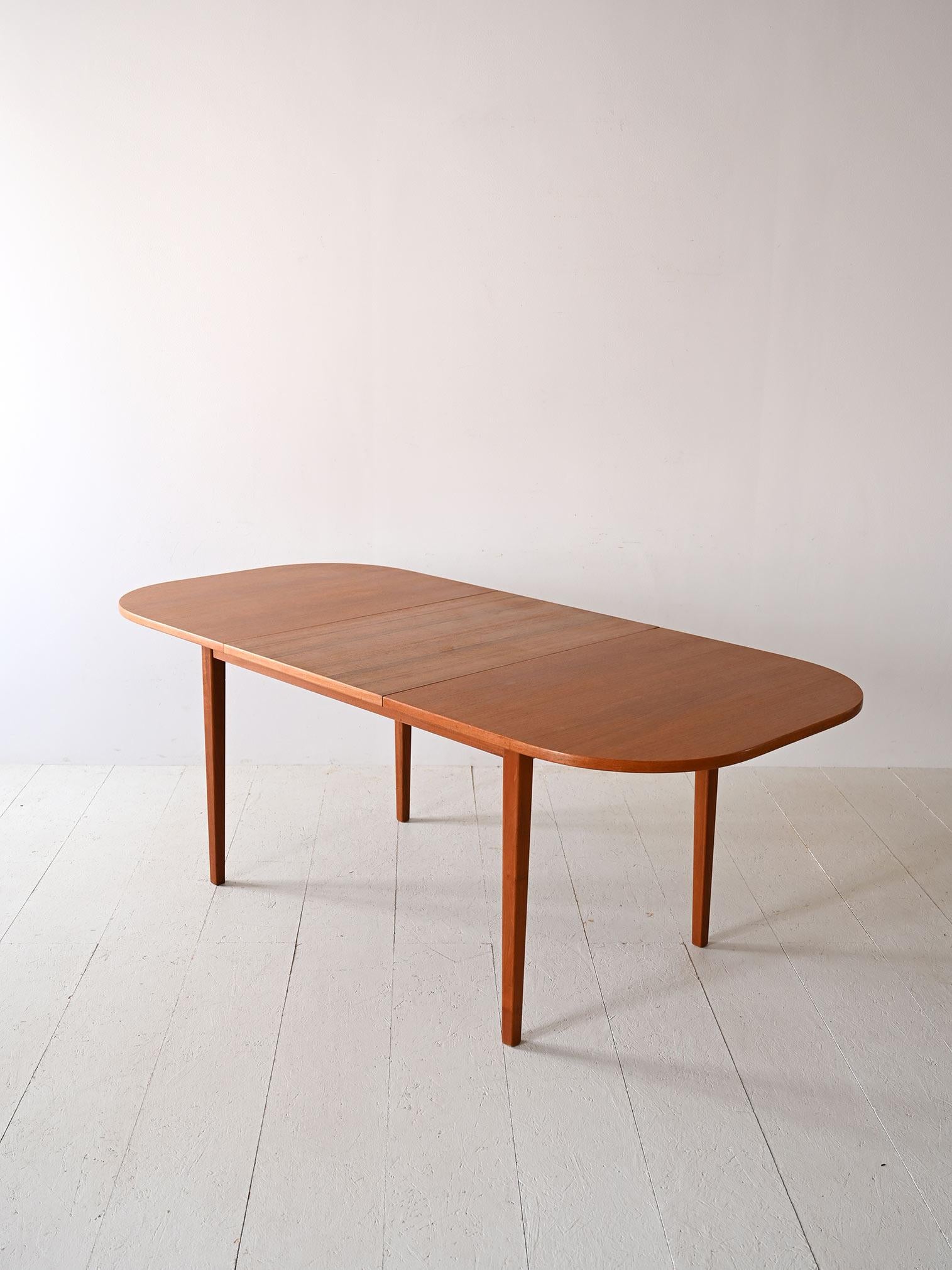 Scandinavian Oval extending teak table For Sale