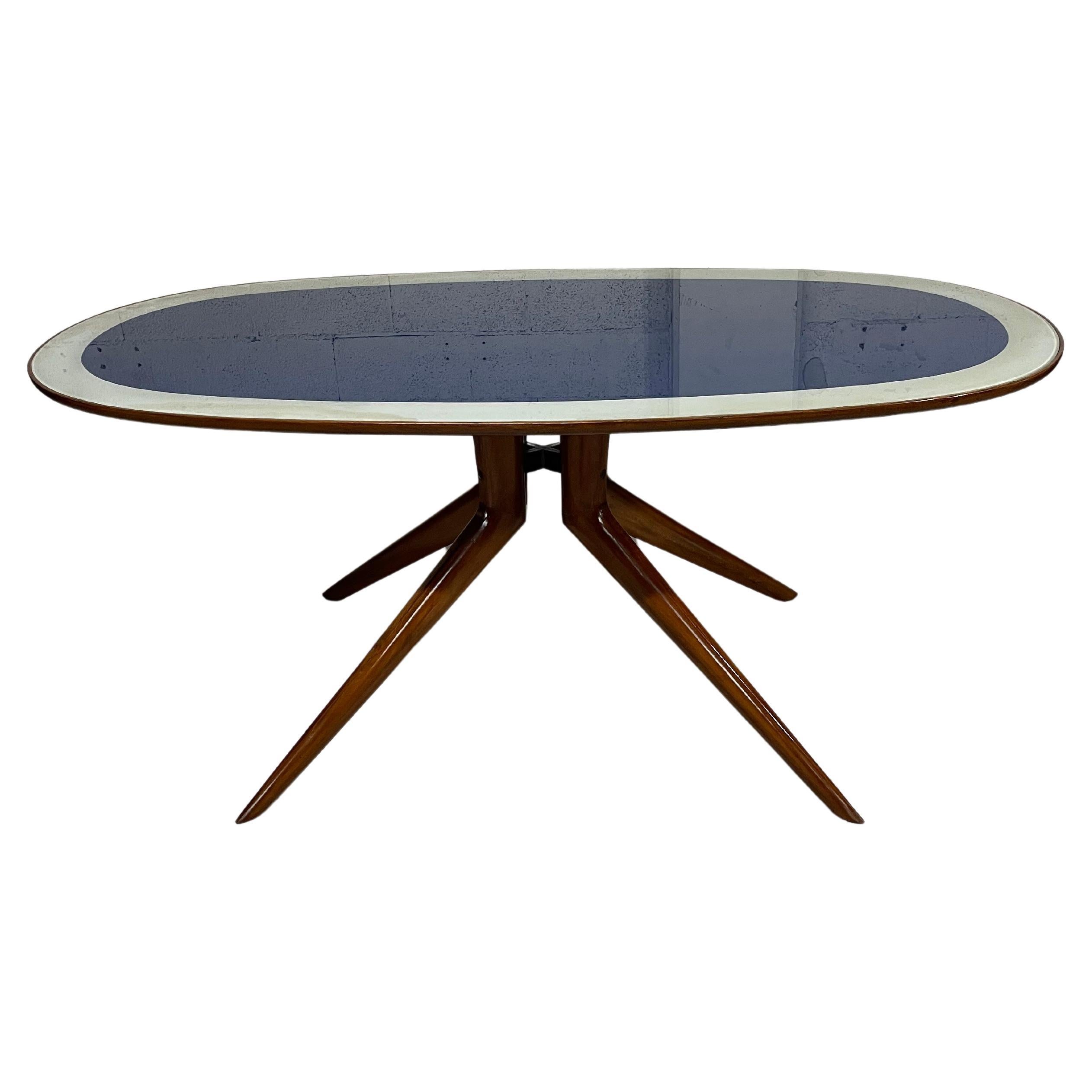 1950s oval table made of beech wood and glass top For Sale