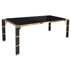Table moderne du milieu du siècle en granit noir et laiton fabriquée en Italie par Cupioli