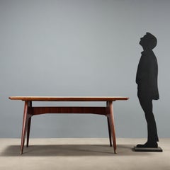 Table rectangulaire des années 50-60 avec plateau en verre traité au verso, restaurée.
