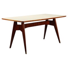 Rectangular table from the 1950s–1960s with a back-painted glass top, restored.