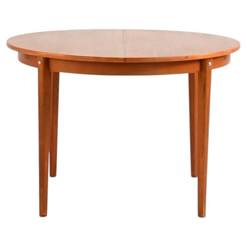 Scandinavian teak 1960s round extendable table For Sale