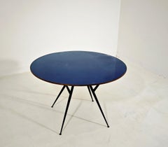 Round table made of blue glass, wood, and black metal; Italy, 1950s, Mid-Century Modern