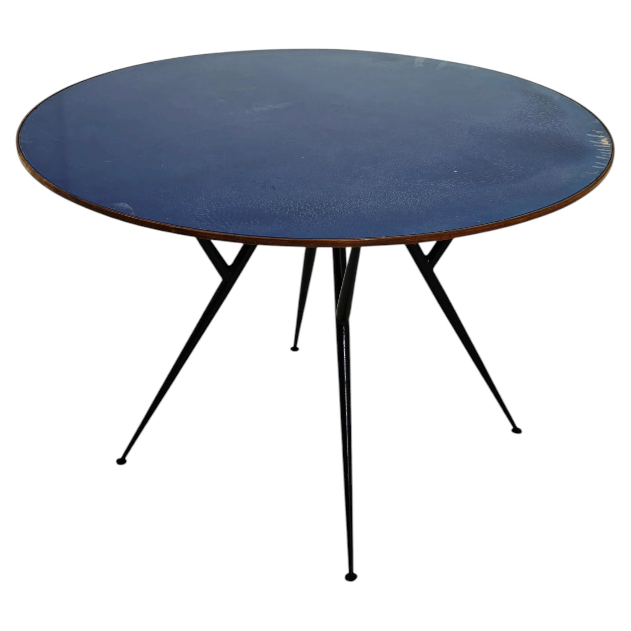 Round table made of blue glass, wood, and black metal; Italy, 1950s, Mid-Century Modern For Sale