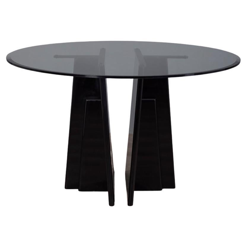 Tavolo rotondo vintage anni
80 in legno nero e vetro, design Italiano