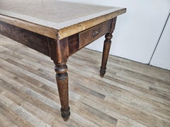 Late 19th-century rustic fir table with a mosaic top and 2 drawers