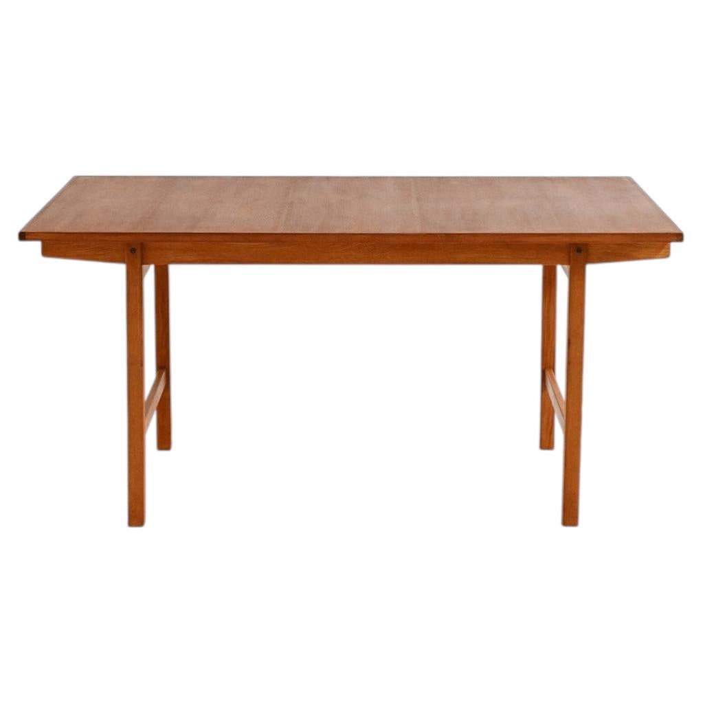 Skandinavischer Ausziehtisch aus Teak und Eiche aus den 1960er Jahren