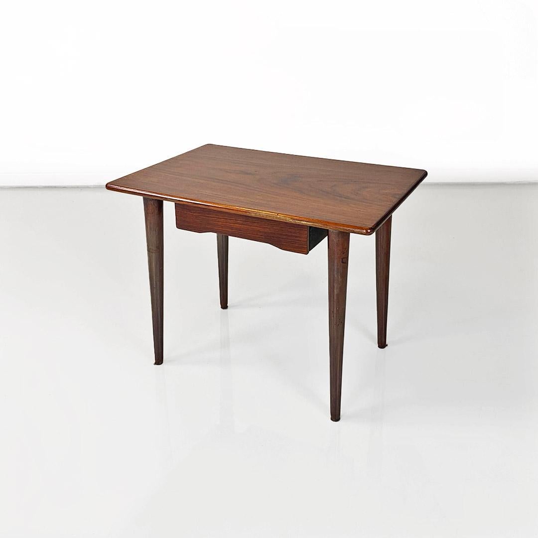 Mid-Century Modern Scandinavian mid-20th-century wooden table with central drawer, ca. 1960. For Sale