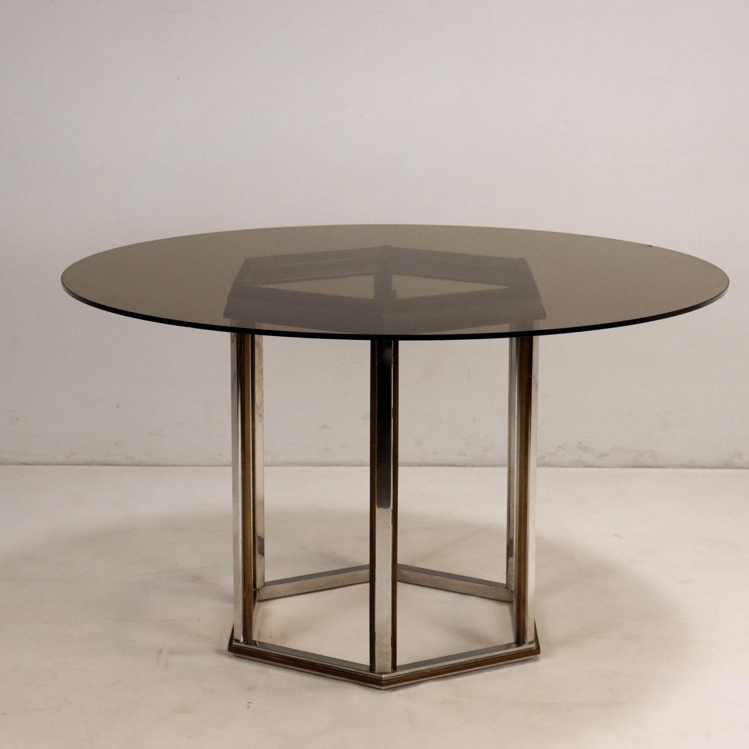 Table with brass base, chrome-plated brass. Smoked glass top. 