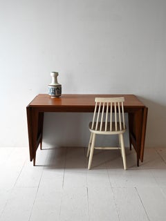 Table vintage ISA Bergamo en teck avec rallonges en forme d'ailes