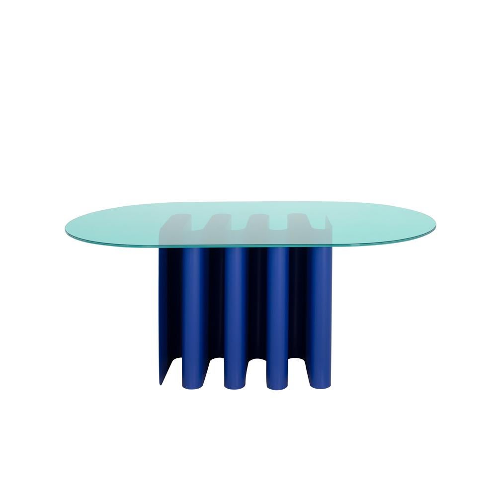 Tavolo2 ultramarine blue dining table by Pulpo
Dimensions: D180 x W100 x H75 cm
Materials: Glass, aluminium

All color combinations available on request. 

Clear lines, avantgarde shape: Julia Chiaramonti’s design philosophy is inspired by the
