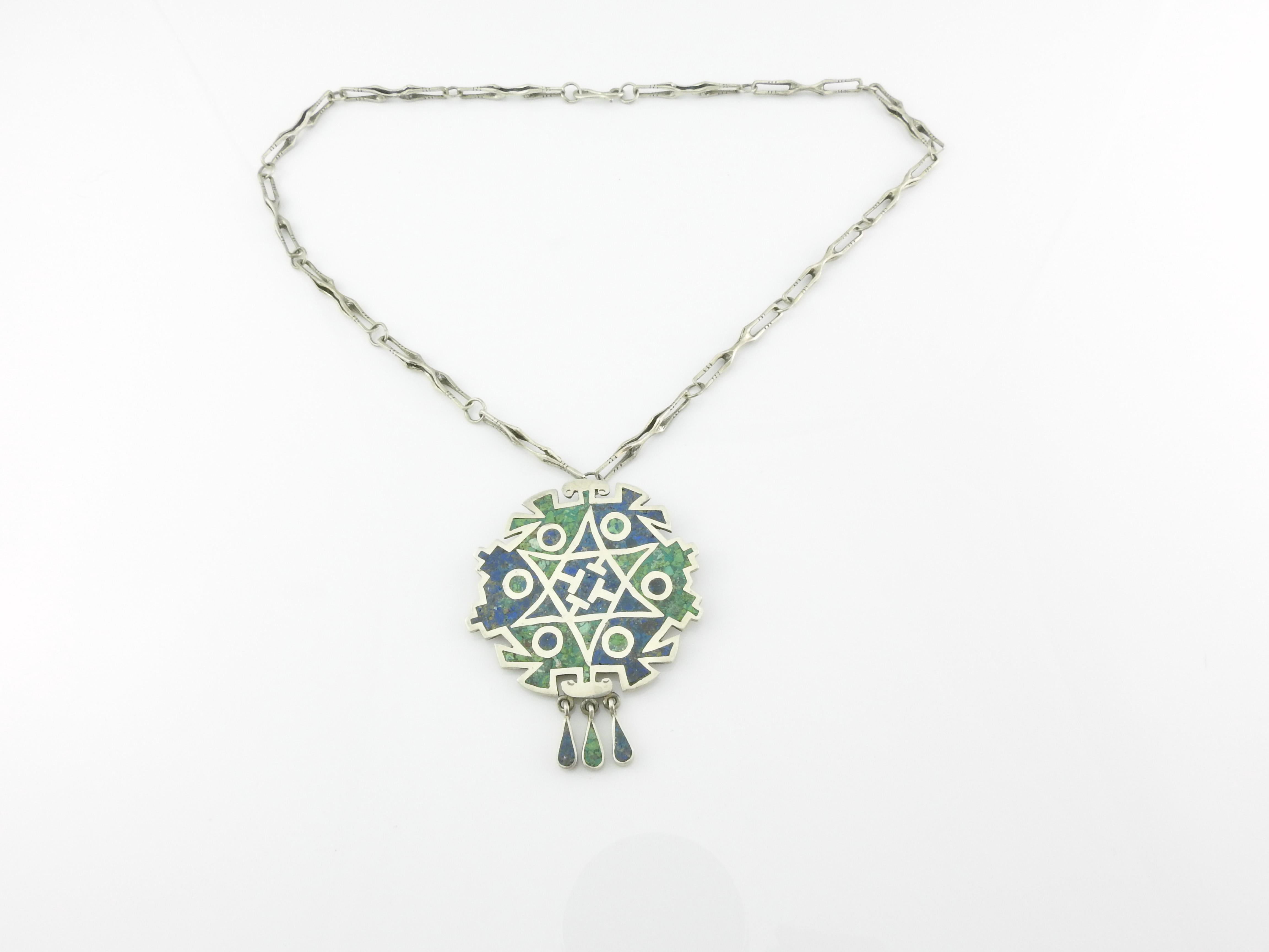 Taxco Mexico Jacopo Bros. Arte en Plata sterling silver Star of David inlay pendant/pin necklace.

Crushed turquoise and blue lapis lazuli.

Marked: ARTE EN PLATA, Taxco Mexico 925, MMA, conjoined JP, 29.

Pendant/pin measures: 2 5/16