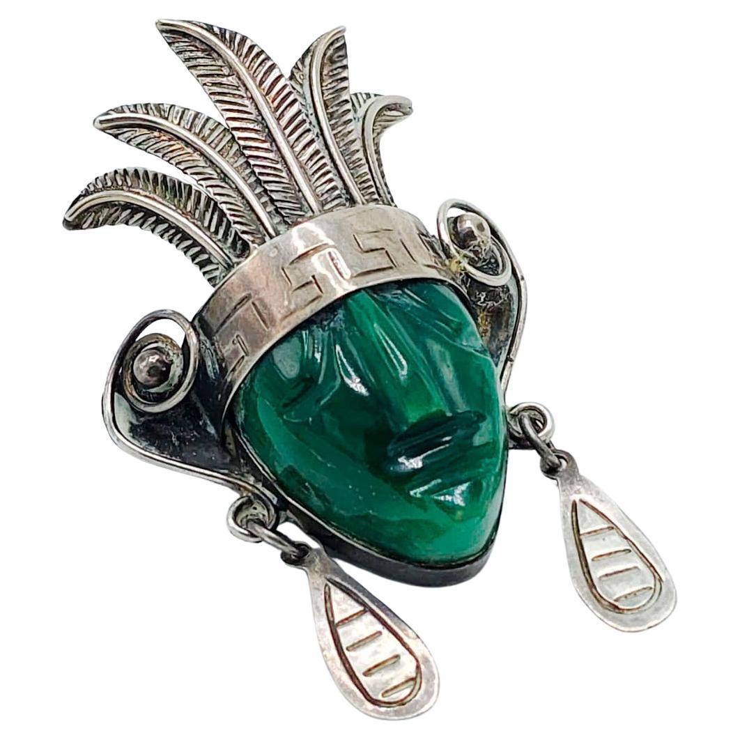 Taxco Mexican Sterling Mask Brooch with Large Green Agate and Stamped Details For Sale