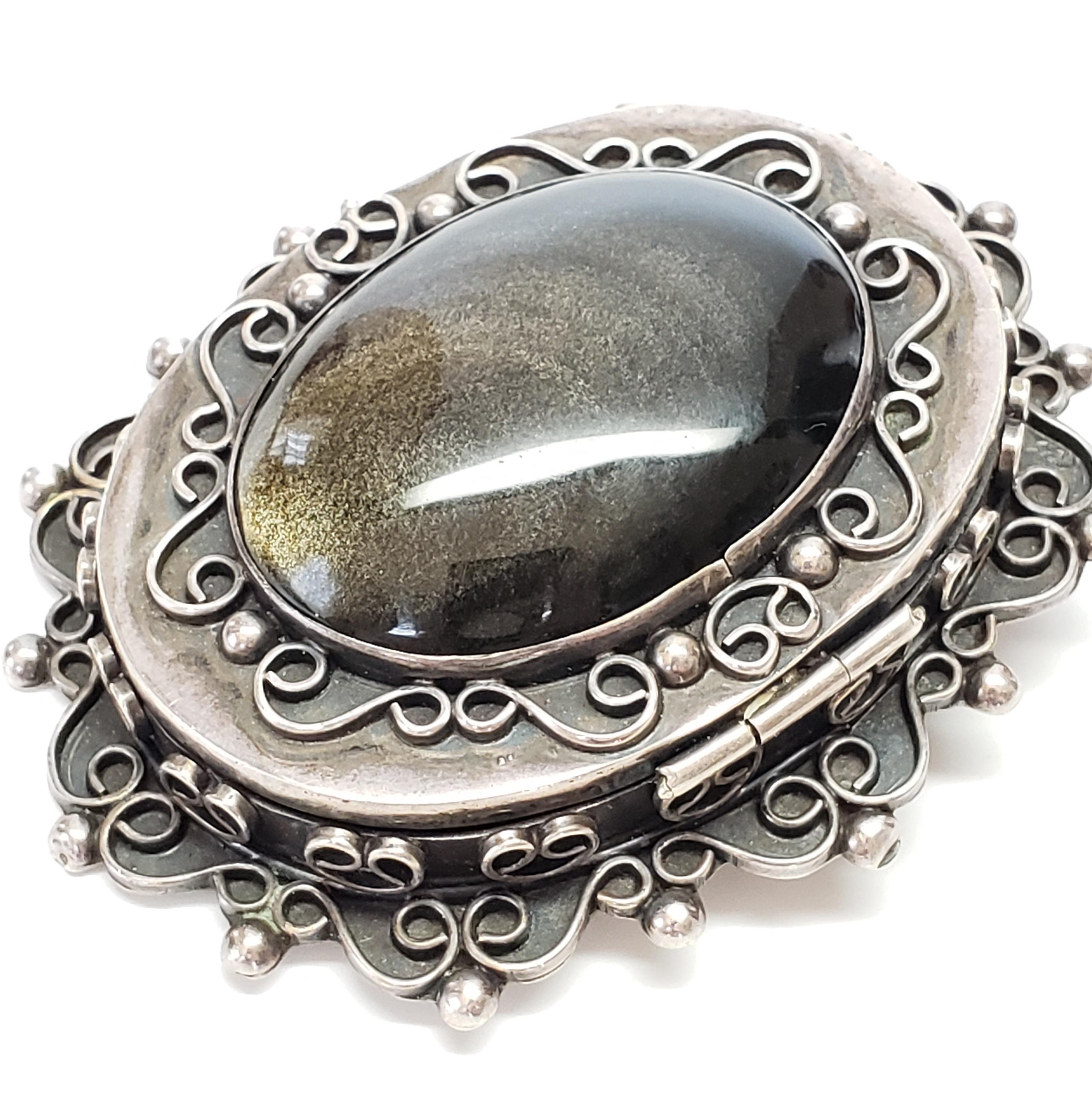 obsidian brooch