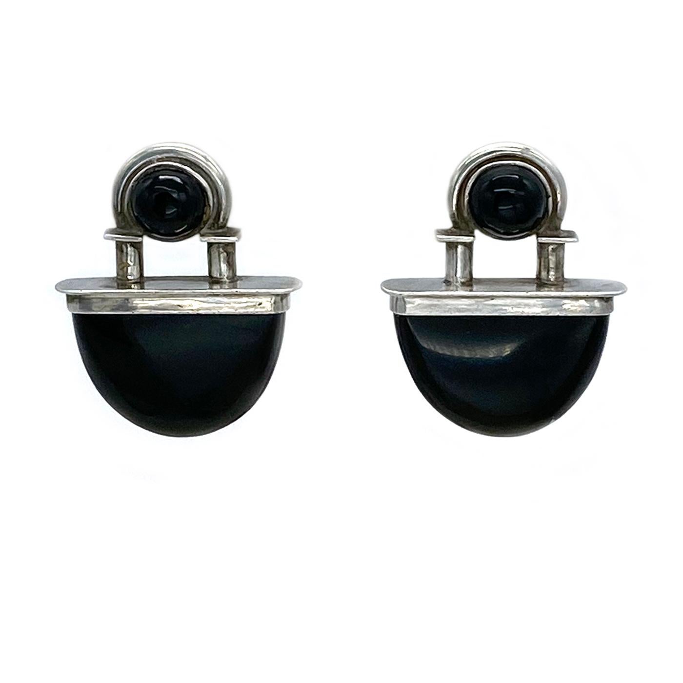 This is a pair of Taxco Mexico Art Deco style earrings. These vintage post earrings are made with 8mm cabochons and large half moon cut black onyx gems.  Marked MEX CO TS-18 on one of the earring's back.

*T stands for Taxco; S stands for the